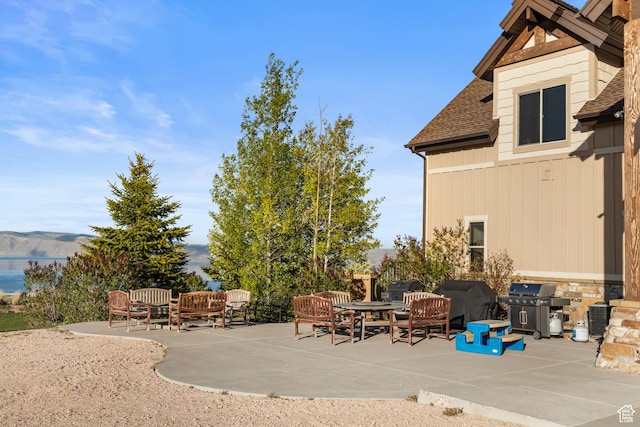 1560 Reserve Dr, Fish Haven, ID 83287 - view of patio with grilling area and a mountain view