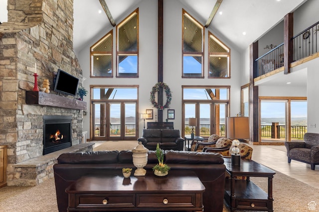 1560 Reserve Dr, Fish Haven, ID 83287 - living room with high vaulted ceiling, a fireplace, and beam ceiling