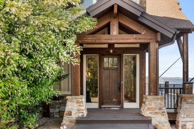 1560 Reserve Dr, Fish Haven, ID 83287 - doorway to property featuring a shingled roof