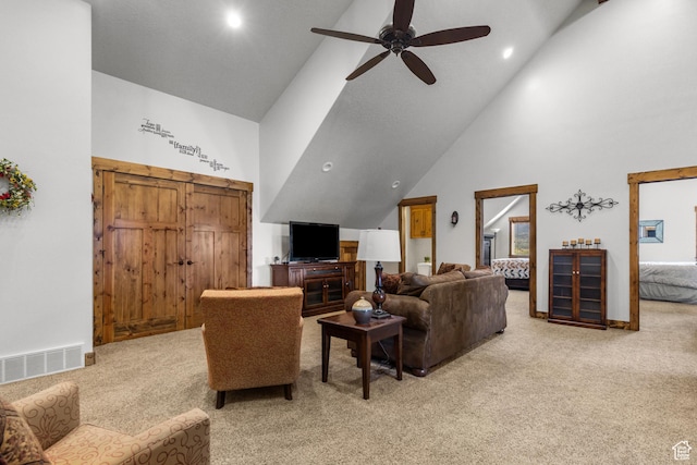 1560 Reserve Dr, Fish Haven, ID 83287 - living room with light colored carpet, high vaulted ceiling, a ceiling fan, and recessed lighting