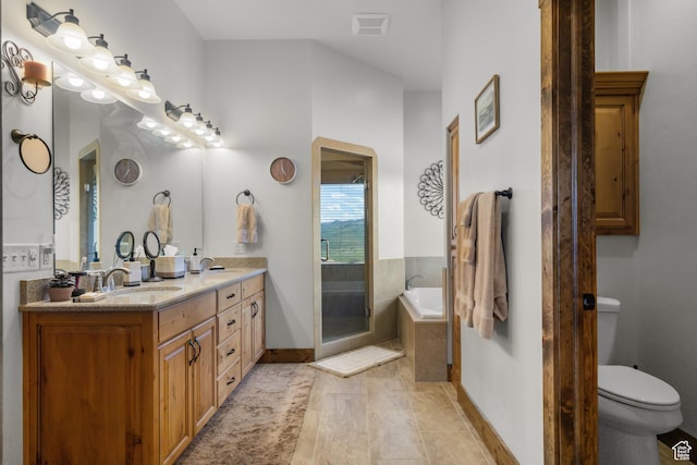 1560 Reserve Dr, Fish Haven, ID 83287 - full bath with double vanity, toilet, a bath, and baseboards