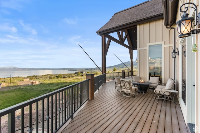 1560 Reserve Dr, Fish Haven, ID 83287 - wooden terrace with a fire pit and a water view