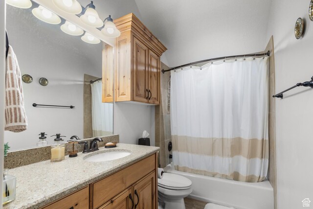 1560 Reserve Dr, Fish Haven, ID 83287 - full bathroom with toilet, vanity, and shower / tub combo with curtain