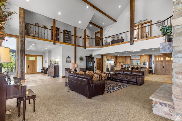 1560 Reserve Dr, Fish Haven, ID 83287 - living room with high vaulted ceiling, light carpet, recessed lighting, beamed ceiling, and baseboards