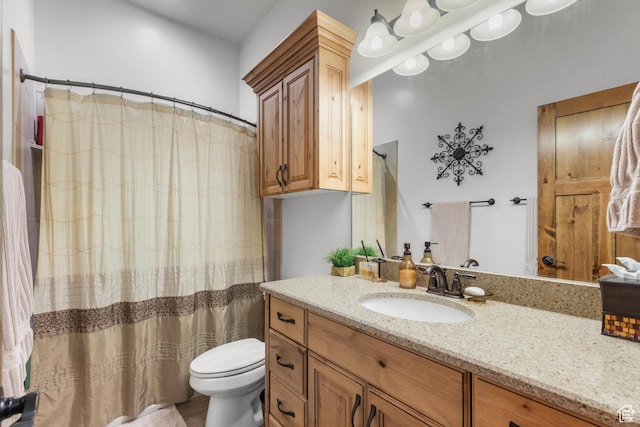 1560 Reserve Dr, Fish Haven, ID 83287 - bathroom featuring vanity, toilet, and curtained shower