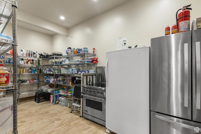 1560 Reserve Dr, Fish Haven, ID 83287 - kitchen featuring appliances with stainless steel finishes, recessed lighting, and wood finished floors