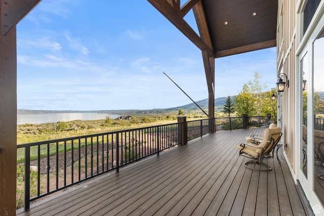 1560 Reserve Dr, Fish Haven, ID 83287 - wooden terrace with a water and mountain view