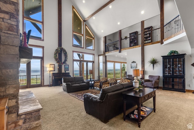 1560 Reserve Dr, Fish Haven, ID 83287 - carpeted living area featuring high vaulted ceiling, beam ceiling, baseboards, and recessed lighting