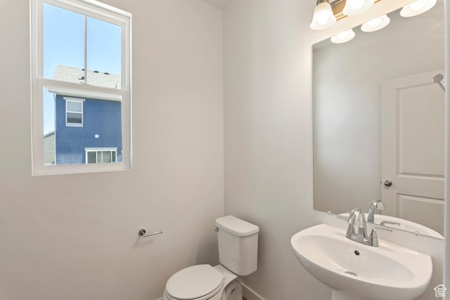 6658 W 11800 S, South Jordan, UT 84009 - half bath with a sink, toilet, and baseboards