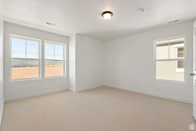 6658 W 11800 S, South Jordan, UT 84009 - empty room with light colored carpet, baseboards, and a smoke detector