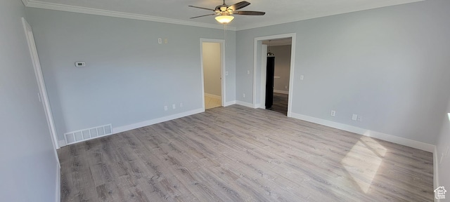 325 W Apple St, Grantsville, UT 84029 - unfurnished room featuring a ceiling fan, wood finished floors, baseboards, and crown molding