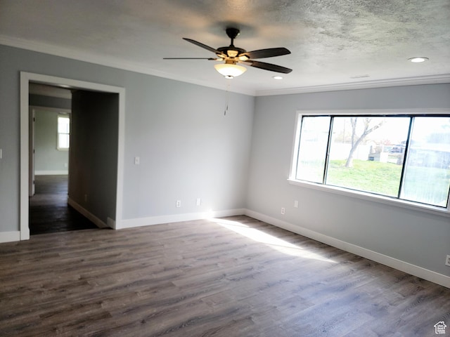 325 W Apple St, Grantsville, UT 84029 - spare room featuring a ceiling fan, dark wood-style floors, baseboards, crown molding, and recessed lighting