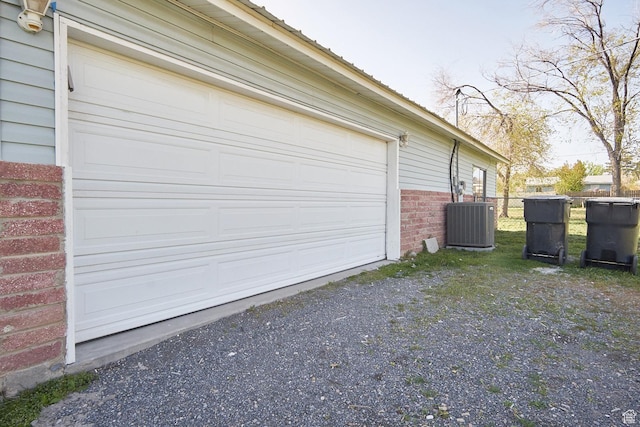 325 W Apple St, Grantsville, UT 84029 - garage featuring central AC and driveway