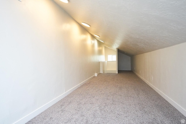 325 W Apple St, Grantsville, UT 84029 - additional living space with lofted ceiling, carpet, and baseboards