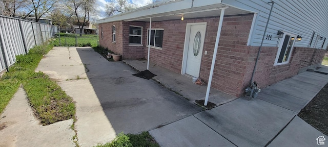 325 W Apple St, Grantsville, UT 84029 - view of home's exterior with brick siding
