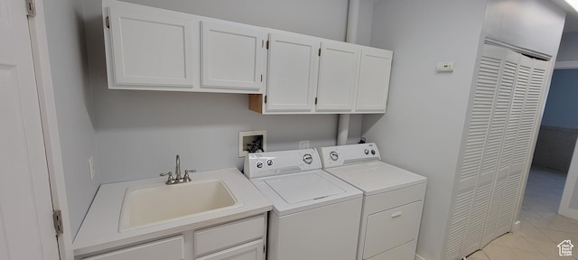 325 W Apple St, Grantsville, UT 84029 - laundry area featuring independent washer and dryer, cabinet space, and light tile patterned flooring