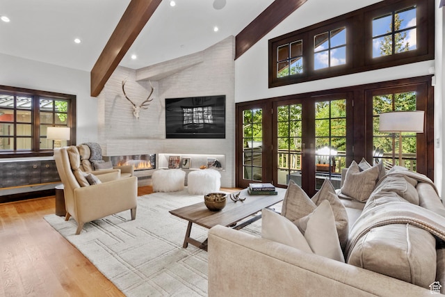 8120 Cache Dr Unit 9, Park City, UT 84060 - living area featuring beamed ceiling, wood finished floors, high vaulted ceiling, and recessed lighting