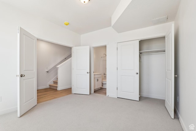 6656 W 11800 S Unit 619, South Jordan, UT 84009 - unfurnished bedroom featuring light colored carpet, baseboards, and a closet