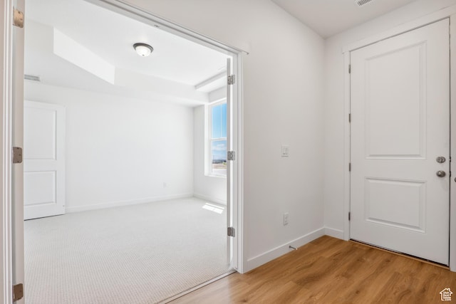 6656 W 11800 S Unit 619, South Jordan, UT 84009 - entryway with baseboards and wood finished floors