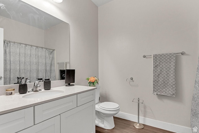 3722 W 1440 N Unit F301, Lehi, UT 84043 - full bathroom with wood finished floors, vanity, toilet, and baseboards