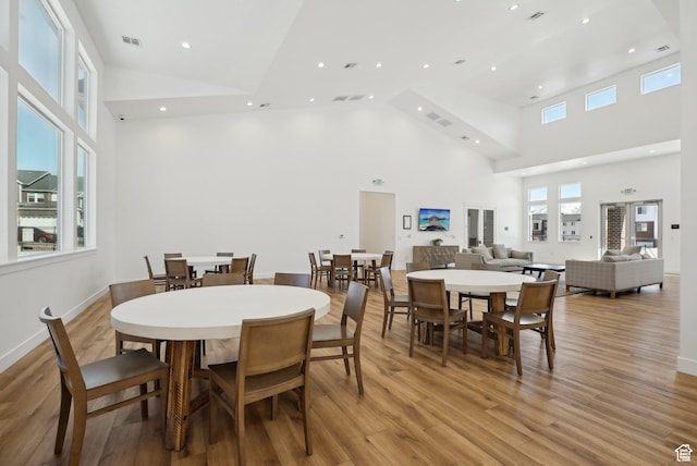 3722 W 1440 N Unit F301, Lehi, UT 84043 - dining room featuring high vaulted ceiling, light wood-style flooring, plenty of natural light, and recessed lighting