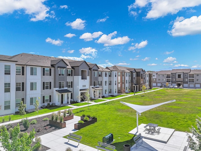 3722 W 1440 N Unit F301, Lehi, UT 84043 - view of community featuring a residential view and a lawn
