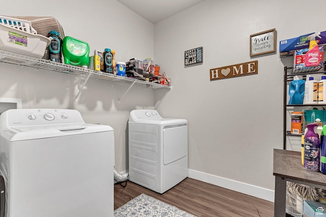 3722 W 1440 N Unit F301, Lehi, UT 84043 - washroom featuring washing machine and clothes dryer, wood finished floors, and baseboards