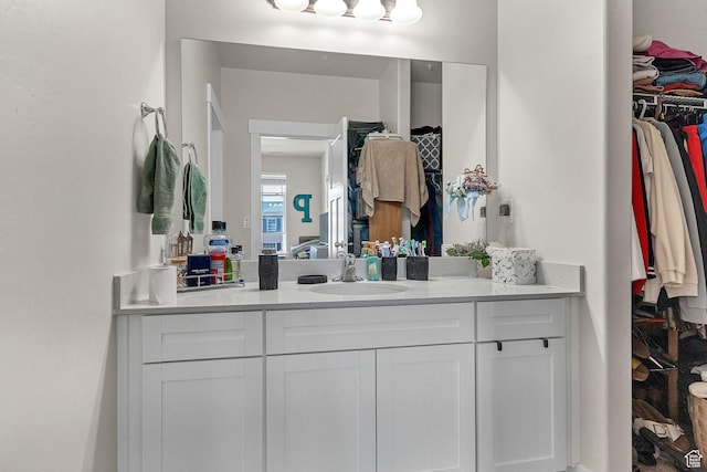 3722 W 1440 N Unit F301, Lehi, UT 84043 - bathroom with vanity and a spacious closet