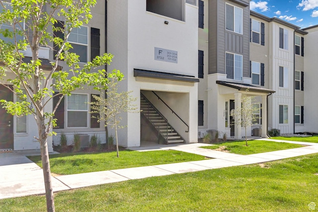 3722 W 1440 N Unit F301, Lehi, UT 84043 - view of property with cooling unit and stairway