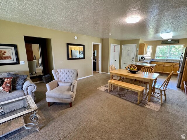 815 N Harbor Dr Unit 201, Garden City, UT 84028 - carpeted dining area featuring a textured ceiling