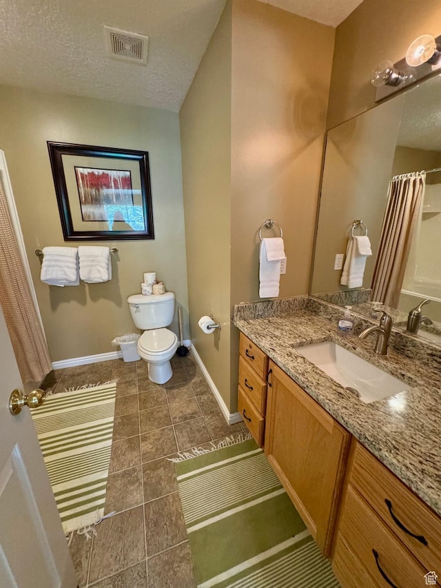 815 N Harbor Dr Unit 201, Garden City, UT 84028 - bathroom with vanity, a textured ceiling, tile patterned flooring, and a shower with shower curtain