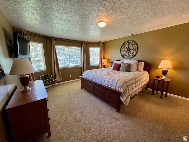 815 N Harbor Dr Unit 201, Garden City, UT 84028 - bedroom featuring light colored carpet and a textured ceiling