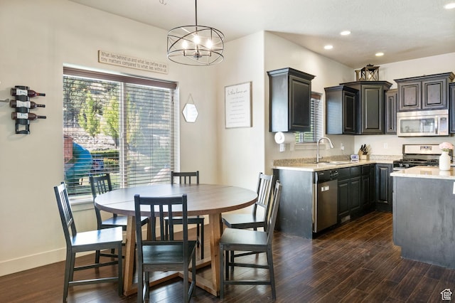 4114 E Cherokee St, Eagle Mountain, UT 84005 - kitchen featuring stainless steel appliances, a sink, dark wood finished floors, recessed lighting, and baseboards