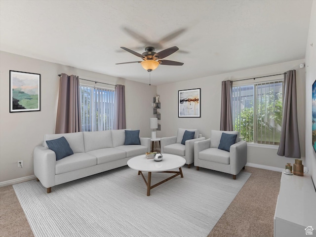 8052 N Clearwater Rd, Eagle Mountain, UT 84005 - living room featuring light carpet and a ceiling fan