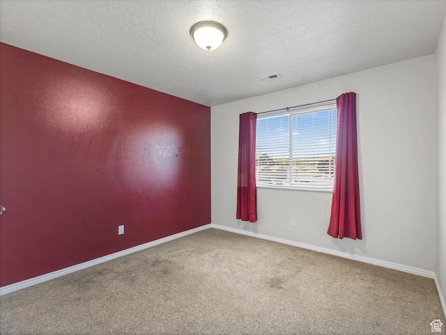 8052 N Clearwater Rd, Eagle Mountain, UT 84005 - spare room with carpet and a textured ceiling