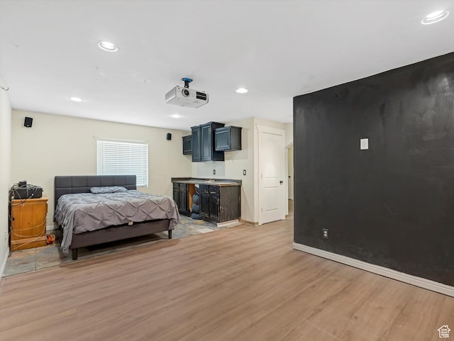 8052 N Clearwater Rd, Eagle Mountain, UT 84005 - bedroom with light wood finished floors and recessed lighting