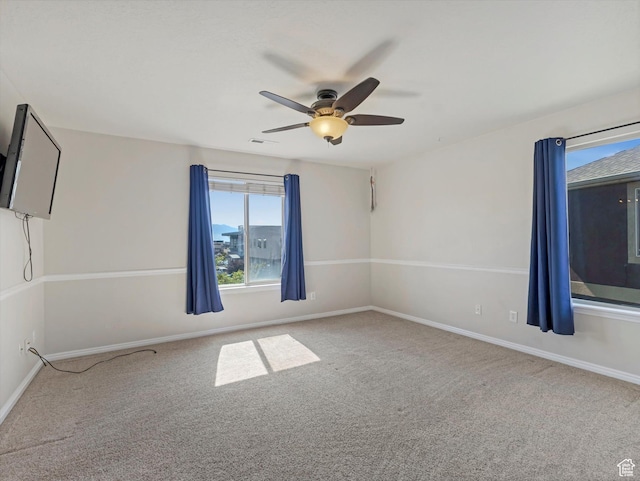 8052 N Clearwater Rd, Eagle Mountain, UT 84005 - carpeted empty room featuring ceiling fan and baseboards