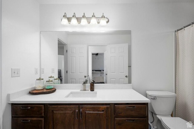 29 E 150 N, American Fork, UT 84003 - bathroom with vanity, toilet, and a shower with shower curtain