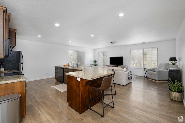 29 E 150 N, American Fork, UT 84003 - kitchen with freestanding refrigerator, plenty of natural light, wood finished floors, a sink, and recessed lighting