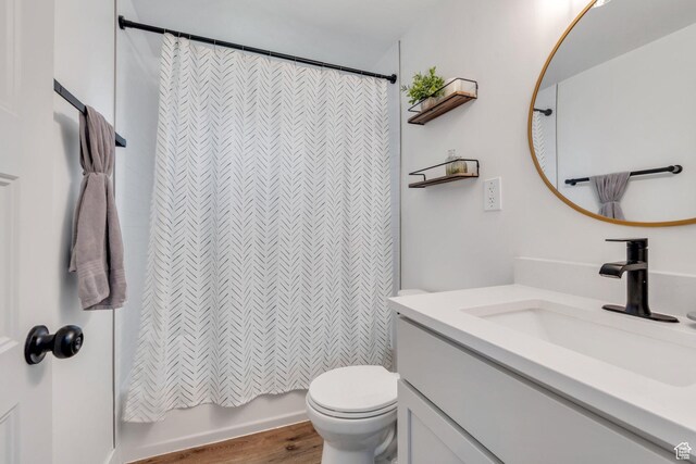 256 N 1040 E, Springville, UT 84663 - bathroom with vanity, wood finished floors, toilet, and shower / tub combo with curtain