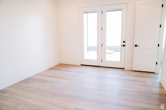 2775 S Rowan Ln, St George, UT 84790 - spare room featuring light wood-style flooring and baseboards