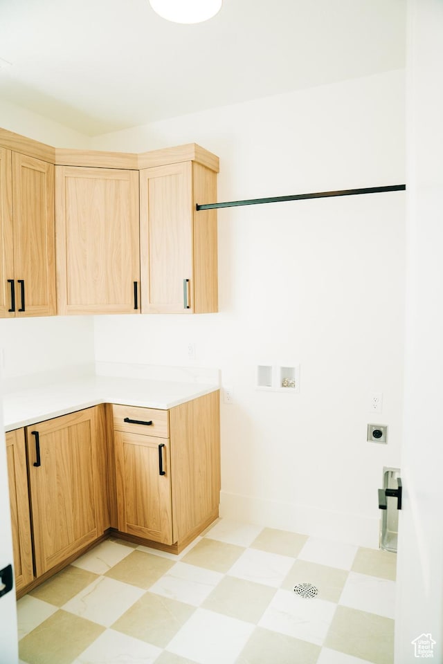 2775 S Rowan Ln, St George, UT 84790 - laundry area featuring light floors, cabinet space, hookup for an electric dryer, and washer hookup