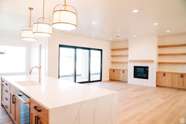 2775 S Rowan Ln, St George, UT 84790 - kitchen with a sink, light wood-style floors, open shelves, stainless steel dishwasher, and recessed lighting
