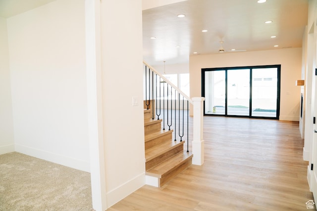 2775 S Rowan Ln, St George, UT 84790 - staircase featuring recessed lighting, baseboards, and wood finished floors