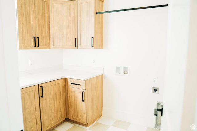 2775 S Rowan Ln, St George, UT 84790 - laundry room with hookup for an electric dryer, cabinet space, washer hookup, and light flooring