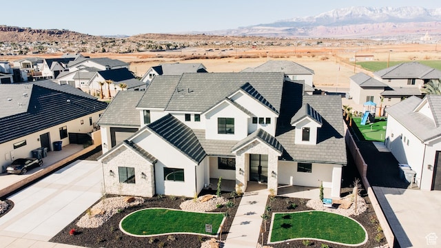 2775 S Rowan Ln, St George, UT 84790 - view of front of property featuring a residential view, a mountain view, a tiled roof, and stucco siding