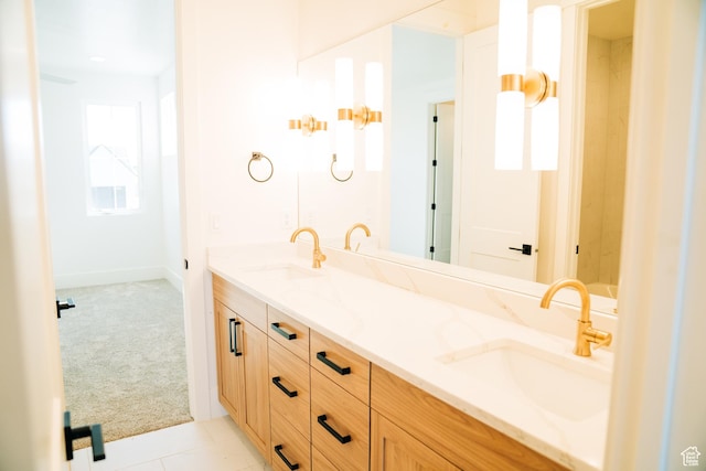 2775 S Rowan Ln, St George, UT 84790 - bathroom featuring double vanity and baseboards