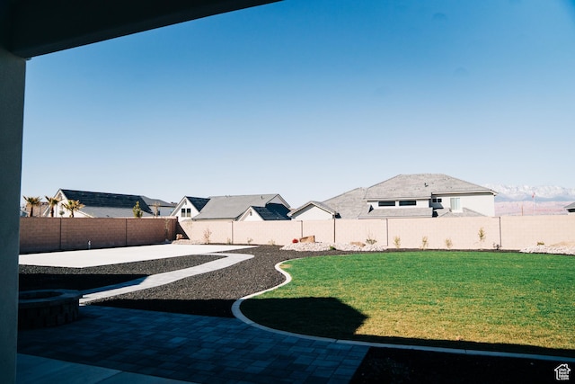 2775 S Rowan Ln, St George, UT 84790 - view of yard featuring a patio and a residential view