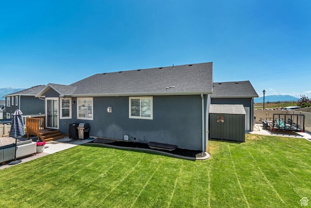 3041 S Hollow Way, Saratoga Springs, UT 84045 - back of house featuring a patio, roof with shingles, a mountain view, and stucco siding