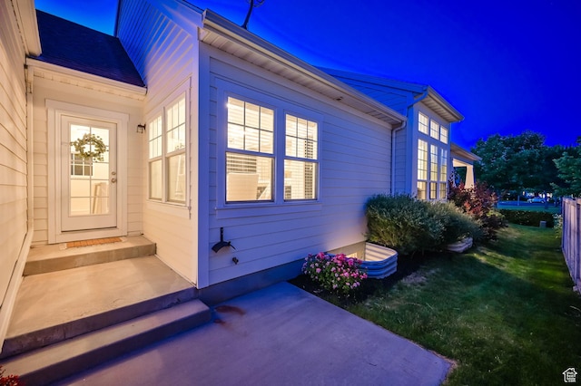 10756 S Navarro Way W, South Jordan, UT 84009 - property exterior at night with a patio and a yard